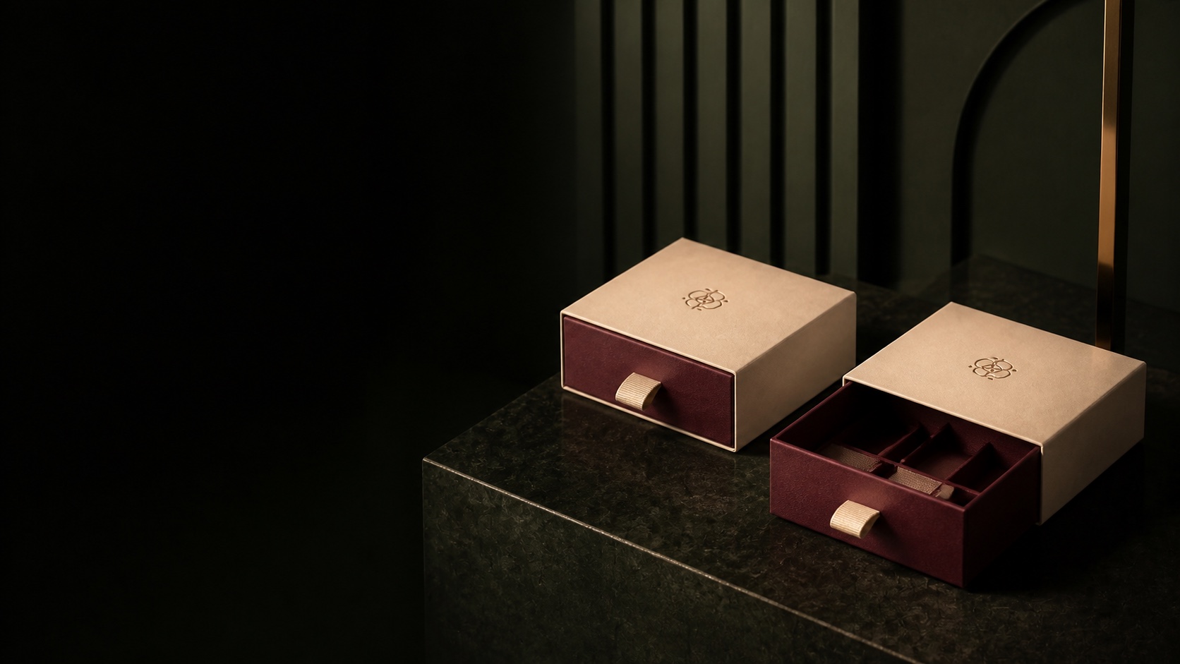 Chocolate Boxes arranged in a dark green editorial studio