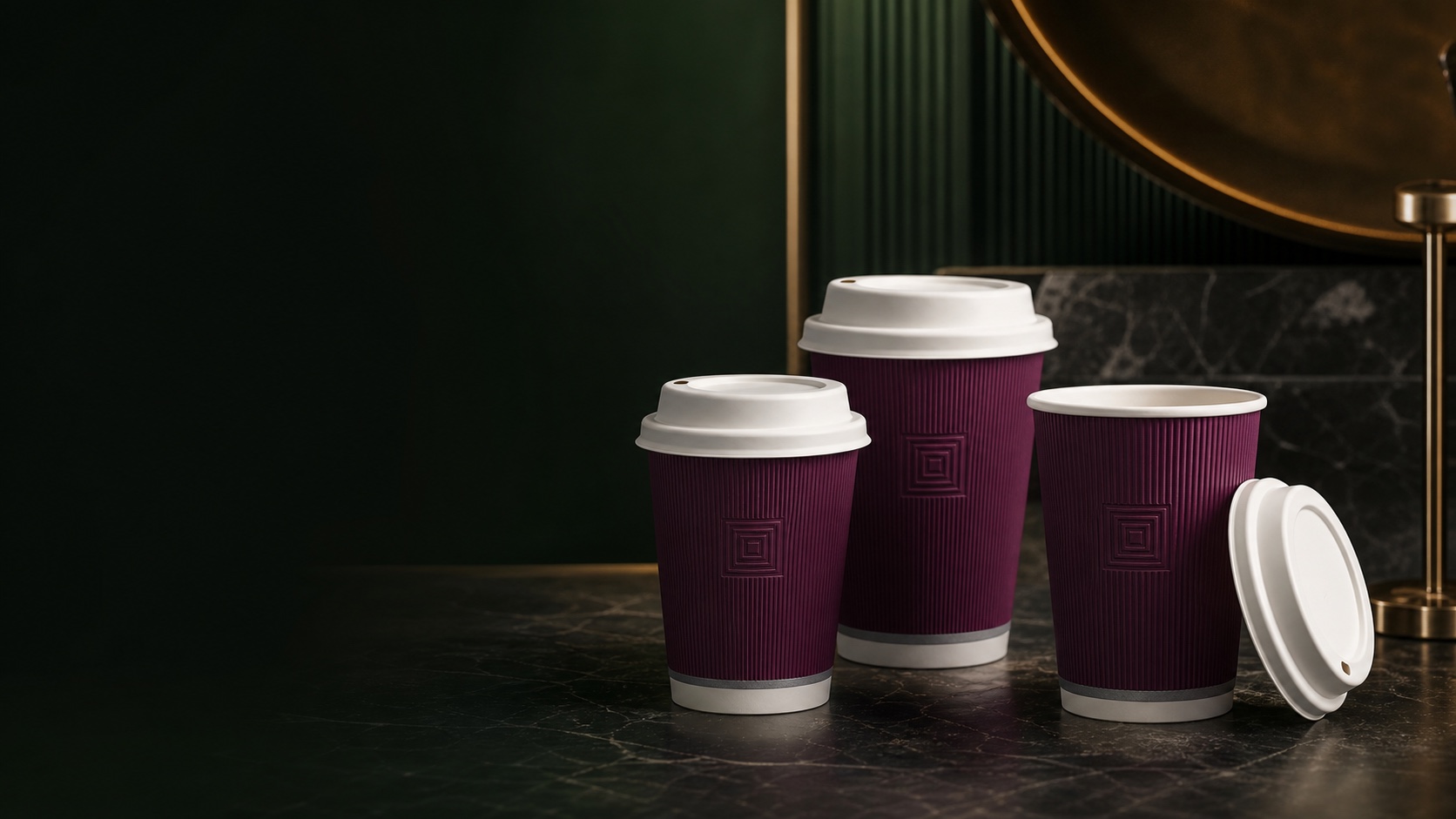 Paper Cups arranged in a dark green editorial studio